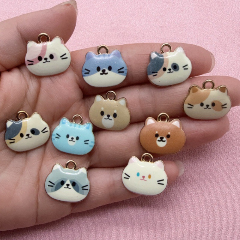 12個入りプリント猫ヘッド合金ドリップオイルペンダント、DI - Jewelry Making Factory のレビューと価格